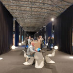 Visitors in a modern exhibition space