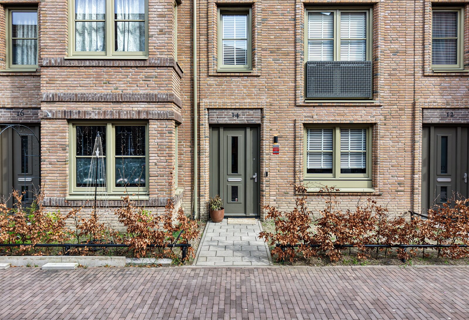 De voordeur als signatuur van de architectuur